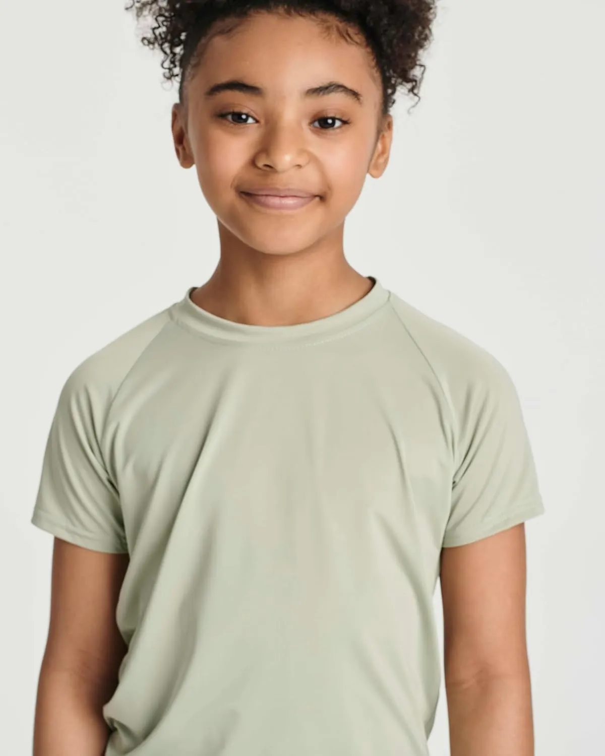 Real Essentials 5 Pack Girls' Short Sleeve UPF Sun Protective Rashguard Swim Shirt Active Athletic (Ages 4-16)